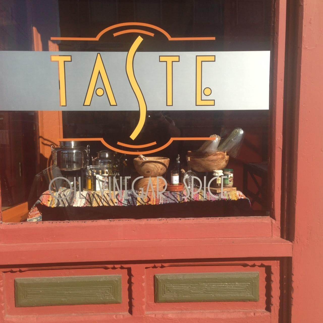 A storefront window display with the word 