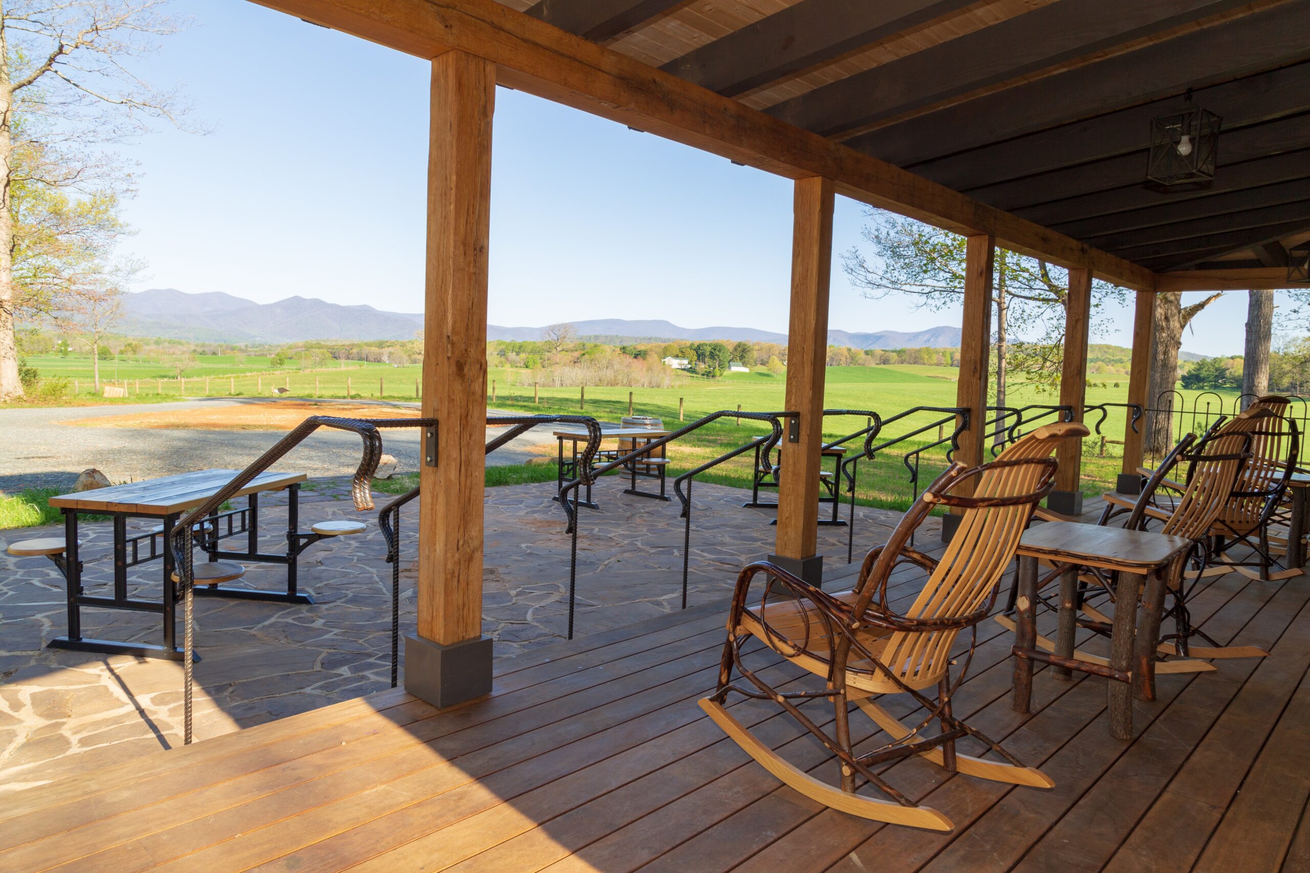 porch with rocking chairs looking out to the mountains