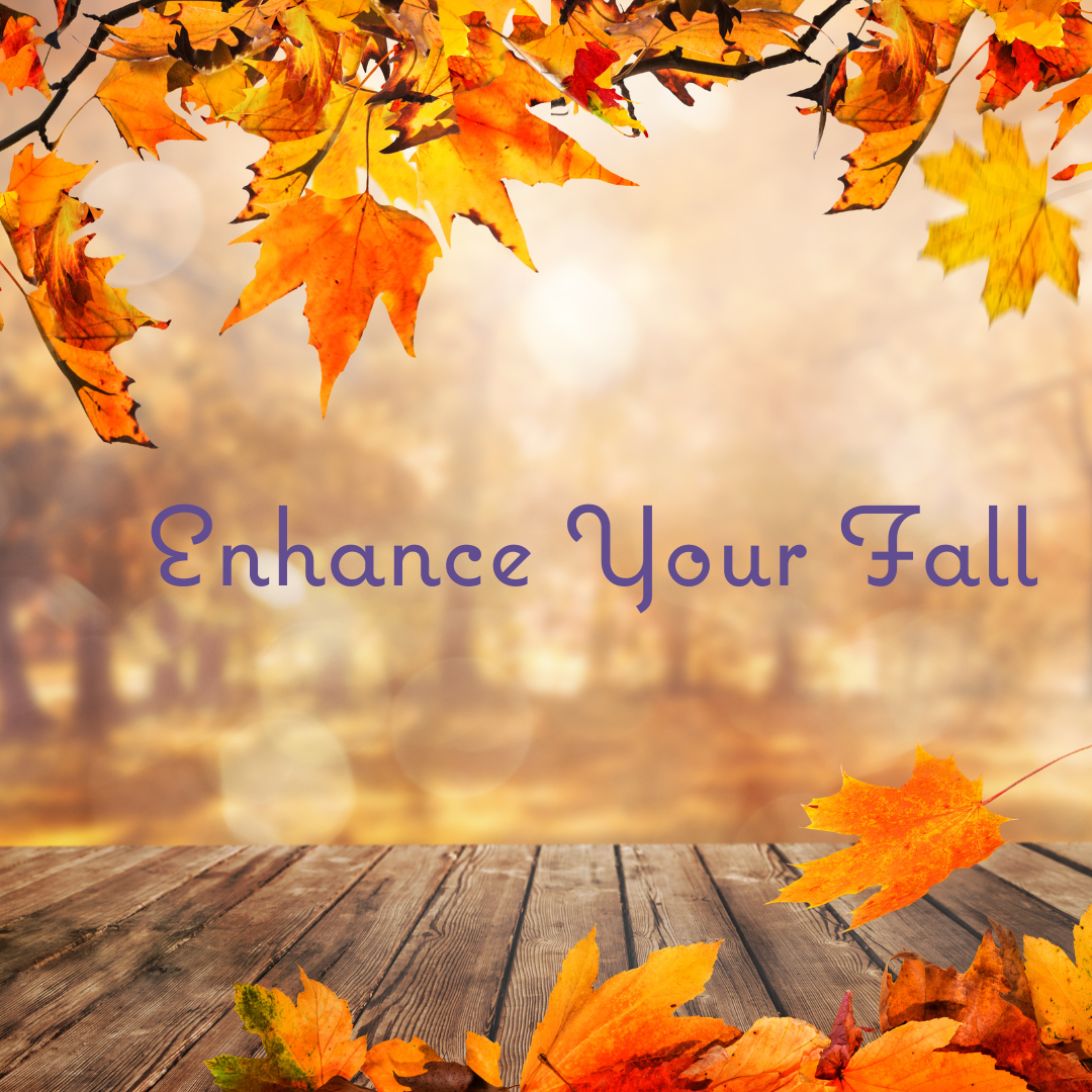 A serene fall scene with vibrant orange and yellow leaves hanging from trees. Wooden planks form a foreground, while a misty background softens the view. The words "Enhance Your Fall" are written in elegant font in the center.