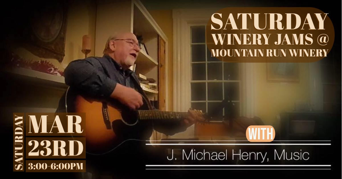 A man plays an acoustic guitar while singing indoors. Text on the image promotes "Saturday Winery Jams @ Mountain Run Winery" on Saturday, March 23rd, from 3:00 to 6:00 PM, featuring J. Michael Henry, Music.
