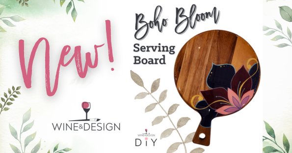 Advertisement for a new Boho Bloom Serving Board by Wine & Design. The serving board features a floral design with vibrant colors. The background includes green leafy graphics and the text "New!" and "Wine & Design DIY.