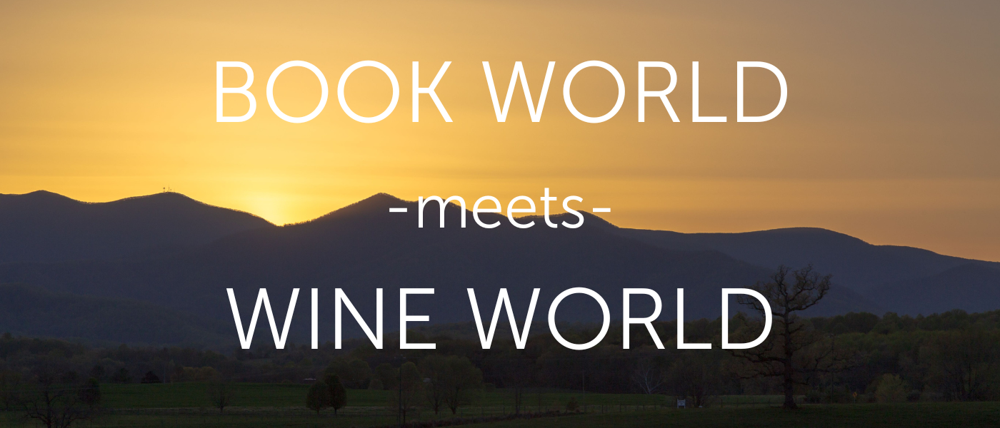 A serene sunset view with mountains and a valley in the background. The text on the image reads, "BOOK WORLD -meets- WINE WORLD.