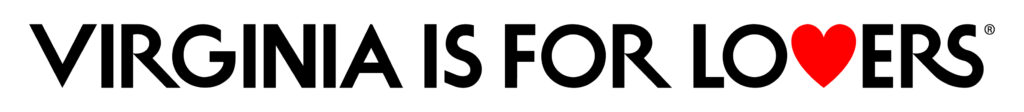 The image displays the slogan "Virginia is for Lovers" in bold black text. The word "Lovers" includes a red heart symbol in place of the letter "O".