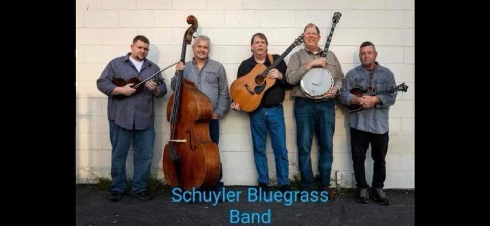 image of Schuyler Bluegrass Band standing together and holding instruments